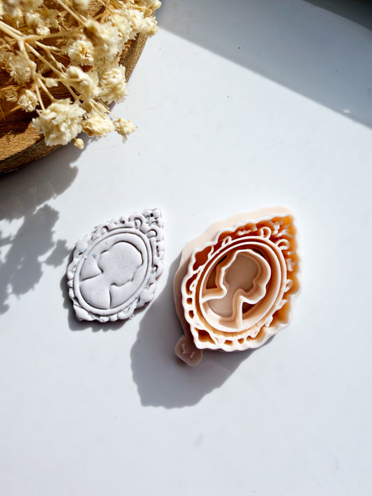 Victorian cameo portrait polymer clay cutter and embossed stamp set for jewelry making and crafts.